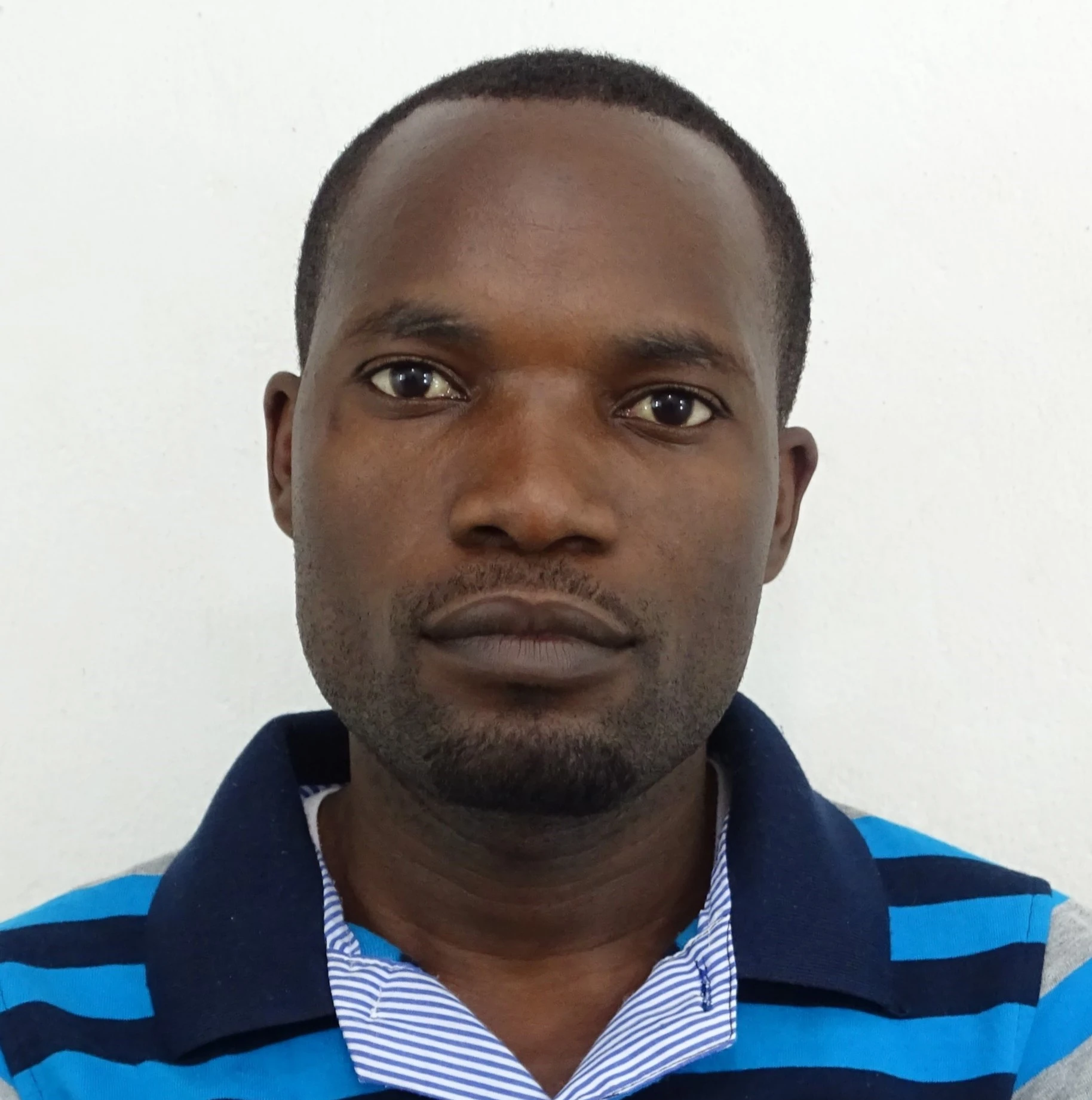 Dr. Blasius Henry Ngayakamo